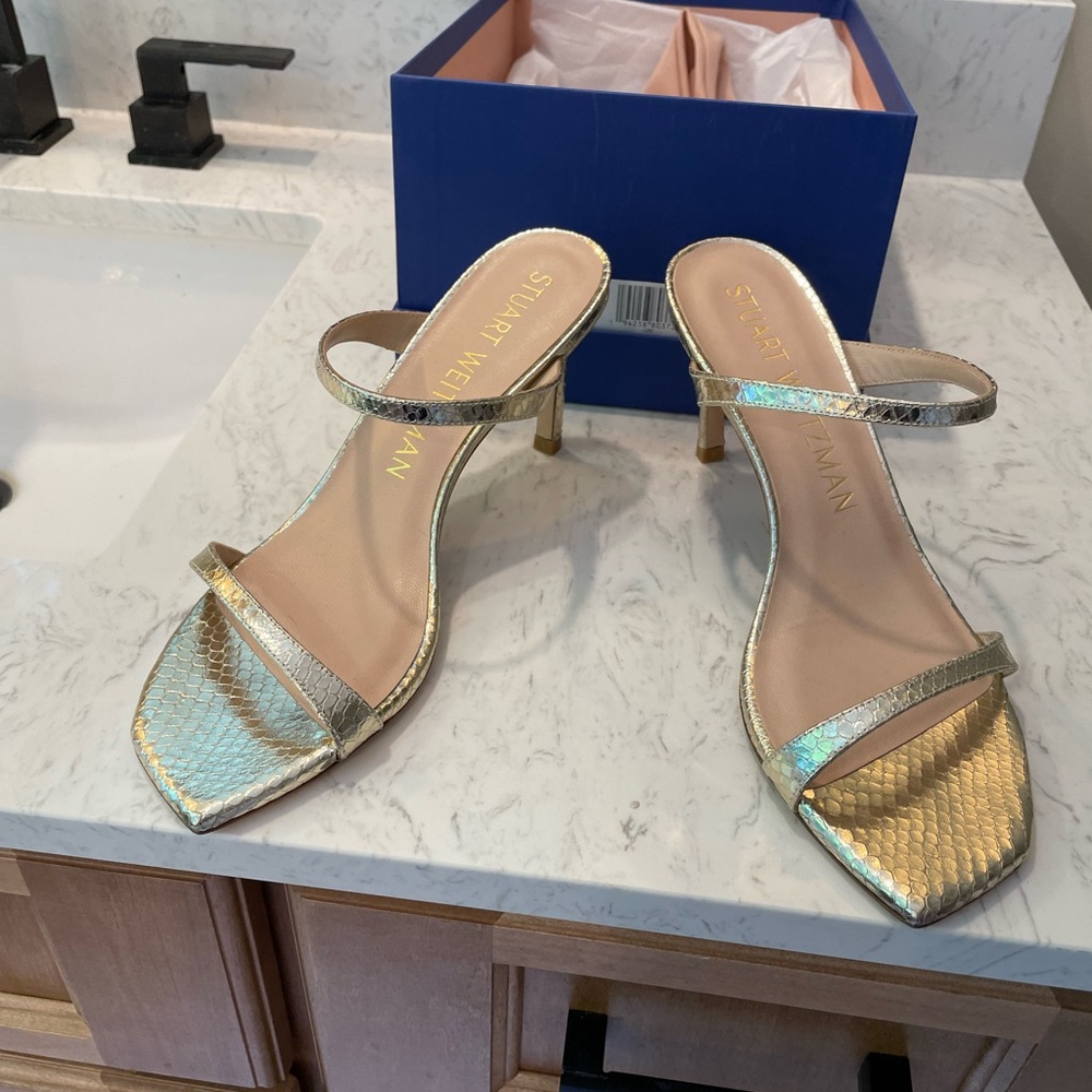 Stuart Weitzman Aleena gold sandal.